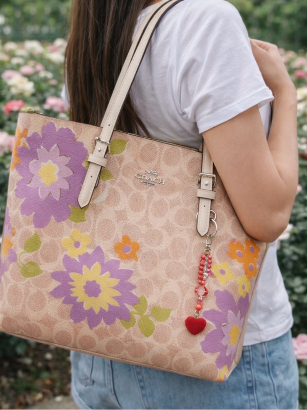 Coach Beige Tote with Purple and Yellow Floral Design - Picture 13 of 14